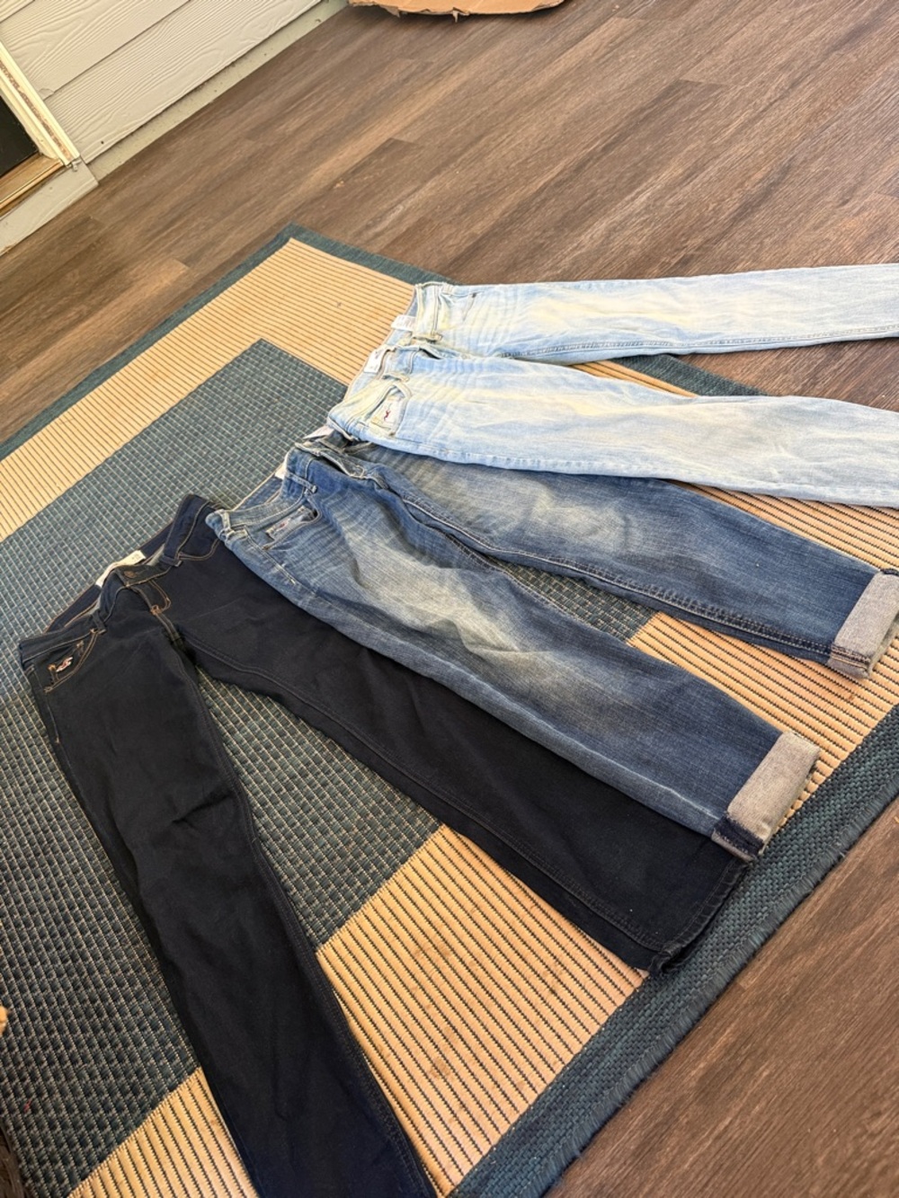 Hollister Women’s Slim Straight Jeans in Dark Navy and Light Blue Washes